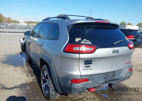 2015 Jeep Cherokee Trailhawk from USA, damaged, VIN 1C4PJMBS0FW527916